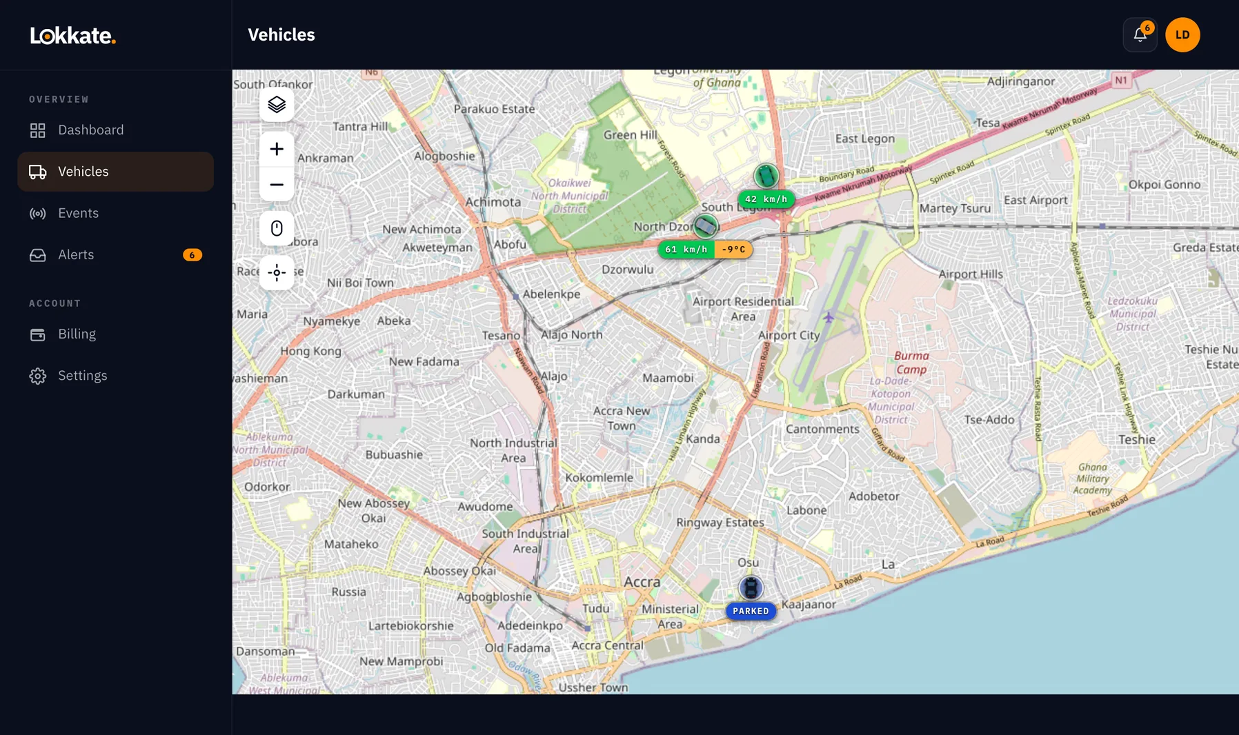 The Lokkate live map on a laptop: three vehicles across Accra, one showing its cargo temperature